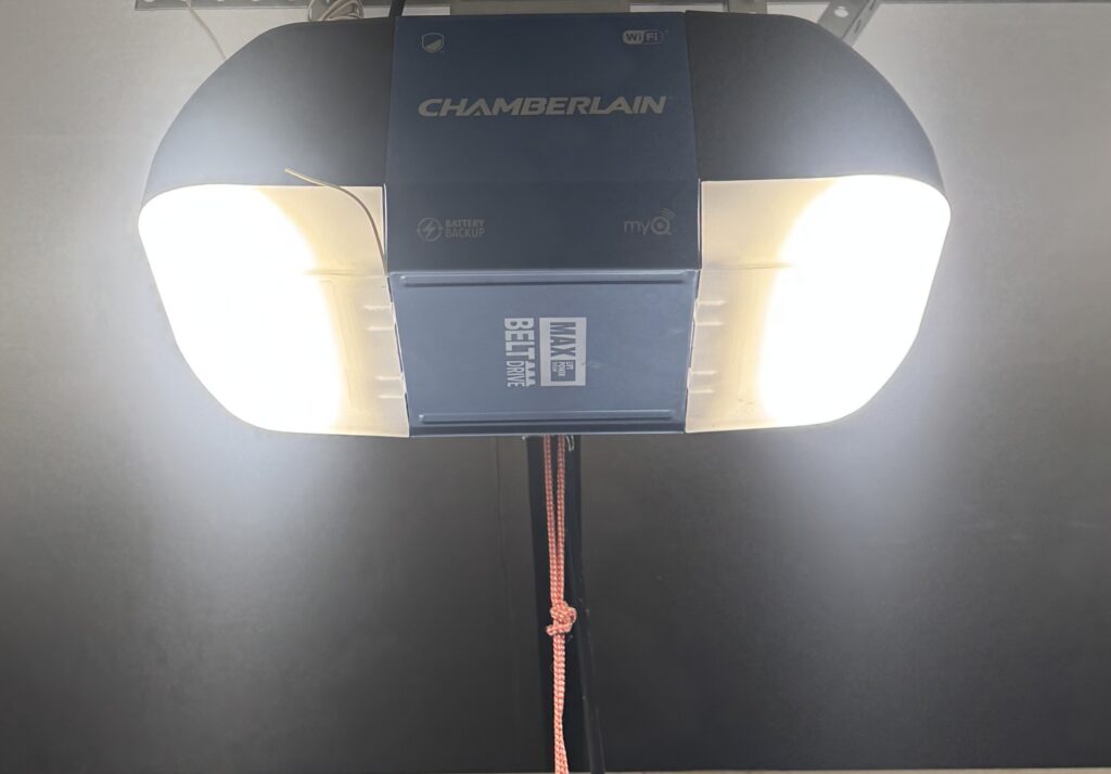 Smart garage door opener setup with smartphone control by Apex Garage Door Service